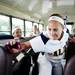 Saline junior Abigail Spickard moves to a different seat while on the bus to East Lansing for the game against Mattawan on Tuesday, June 11. Daniel Brenner I AnnArbor.com